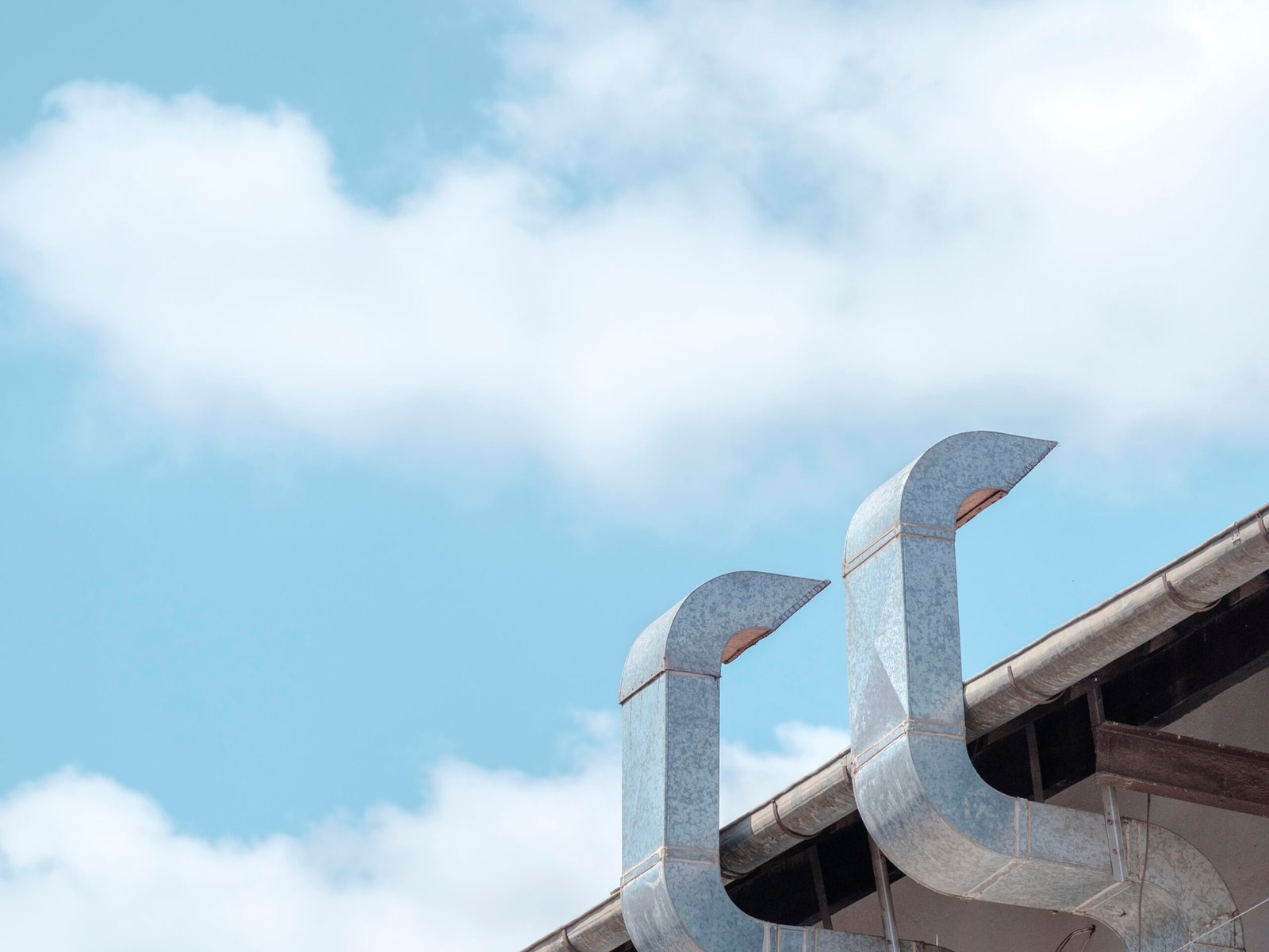 metal chimney and sky